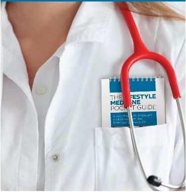 Doctor with red stethoscope, white coat, pocket guide.