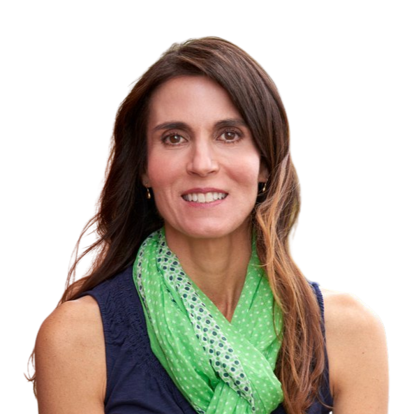 Woman wearing a green scarf smiles at the camera.