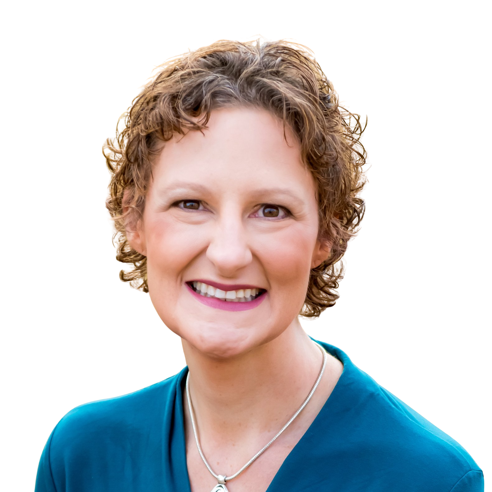 Woman with curly brown hair smiles, wearing a turquoise top, silver necklace, and against a white background.