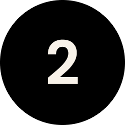 White number 2 inside a black circle.