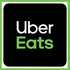 Uber Eats logo on black background, white “Uber” text above green “Eats” text