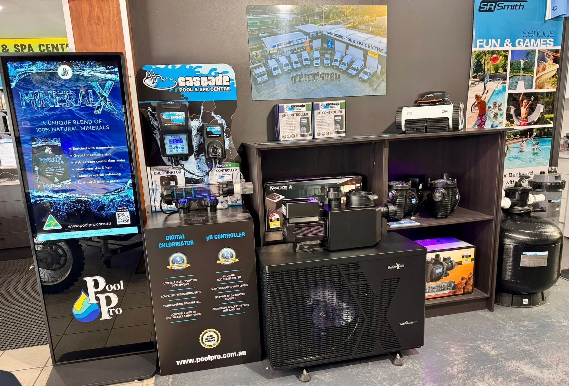 A Pool Supplies Display Various Equipment, Signage, Dark Colors, Inside a Store — Cascade Pool & Spa Centre in Laurieton, NSW