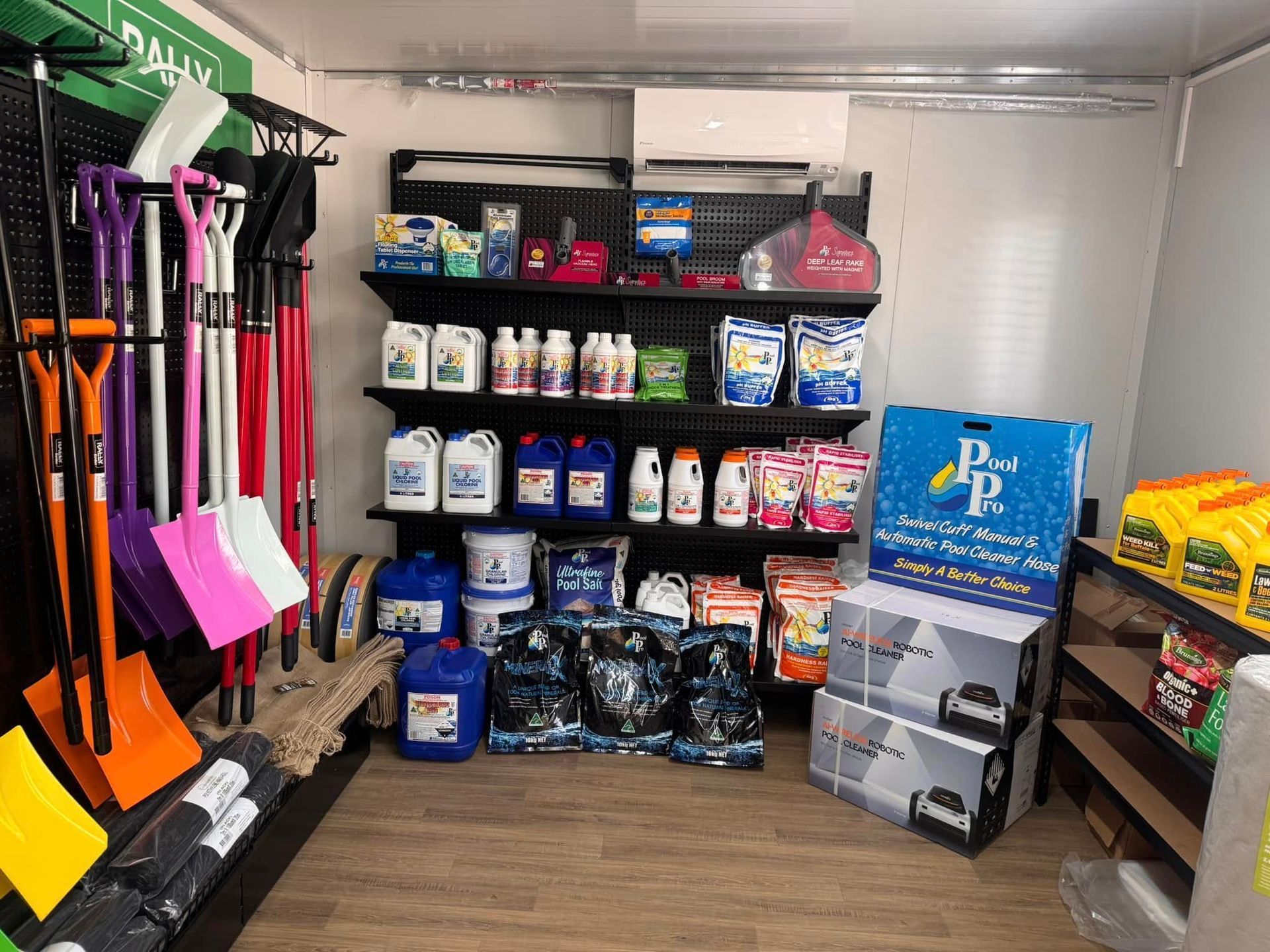 A Interior Shop Display of Cleaning Supplies: Shovels, Chemicals, and Pool Products — Cascade Pool & Spa Centre in Wauchope, NSW