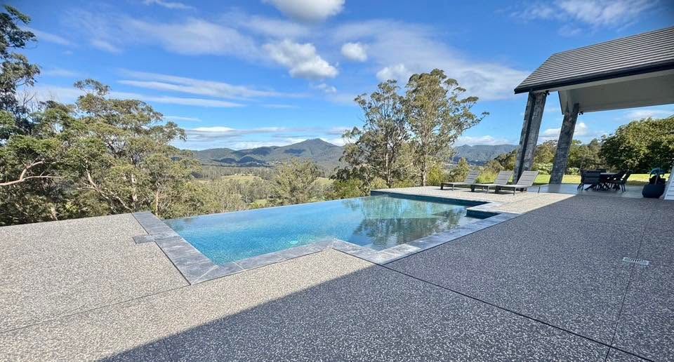 Infinity Pool Overlooking Mountains and Sky From a Shaded Patio — Cascade Pool & Spa Centre in Port Macquarie, NSW