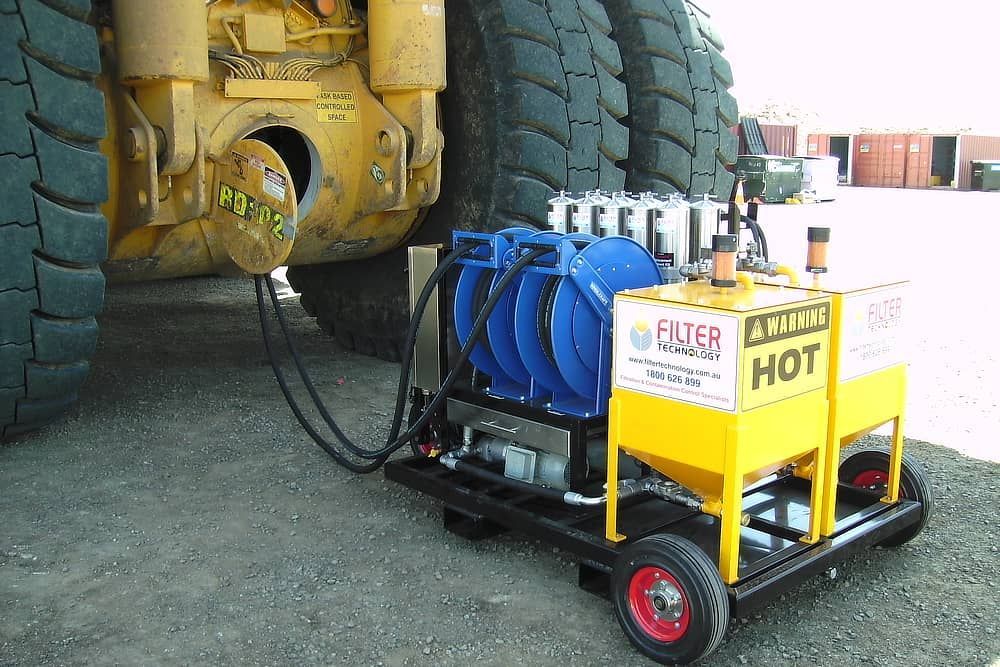 A yellow and blue machine that says filter hot on it