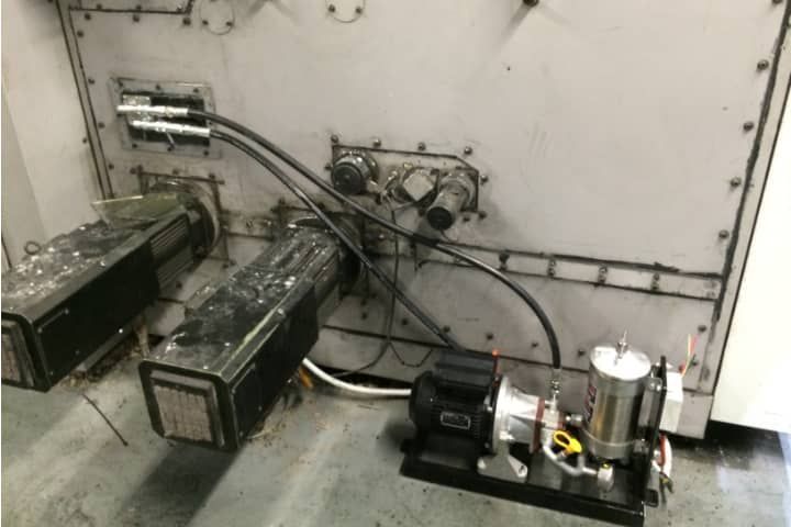 A machine with a motor and a pump attached to it