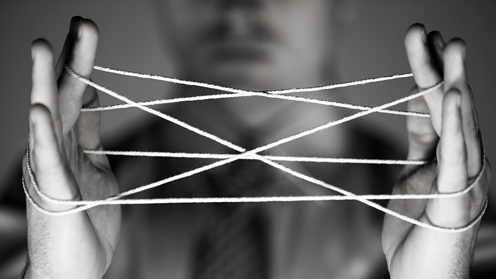 man playing with string