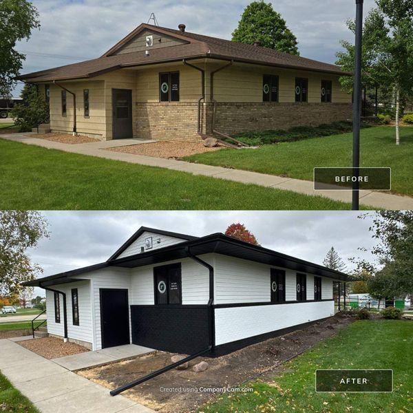 A before-and-after shot showing a building exterior renovated from tan stone and brown to a black-and-white color scheme.
