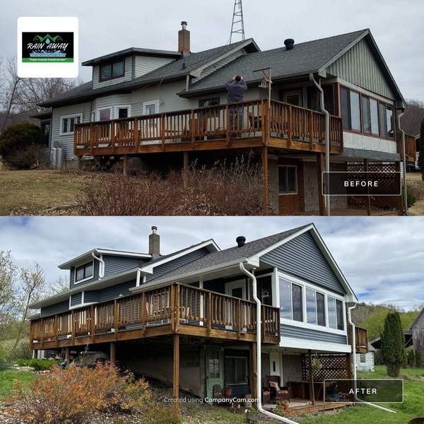 Before and after comparison of a house exterior renovation, showing a change from tan stucco to dark blue vinyl siding.