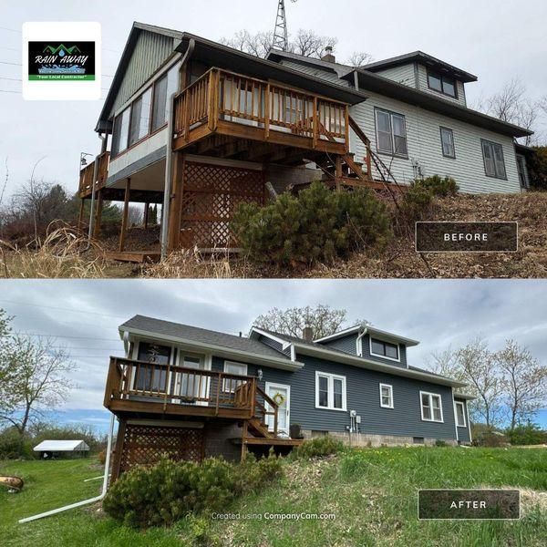 Before and after comparison of a house exterior transformed from light gray to dark blue siding.
