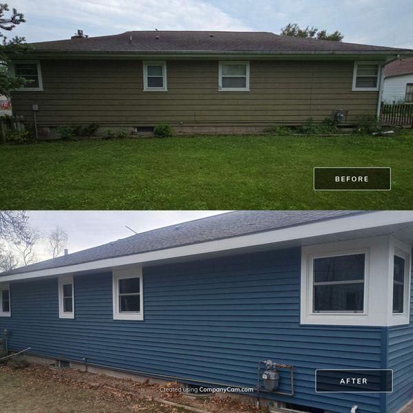 Before and after photos showing a house exterior renovated from olive-green to blue siding with new white trim.