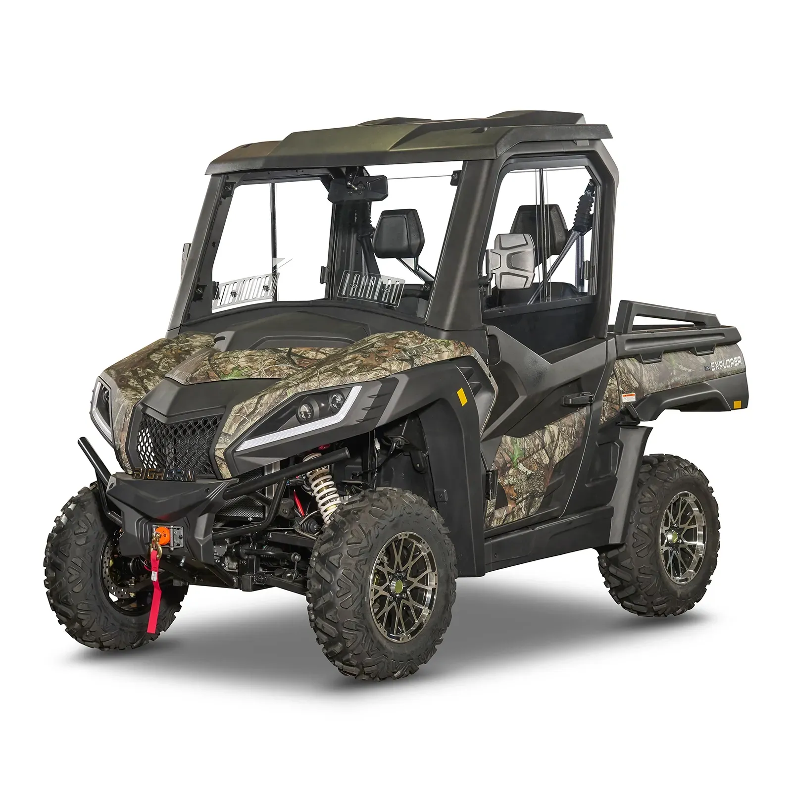 Camouflage off-road side-by-side UTV with roll cage, rugged tires, and cargo bed on a white background