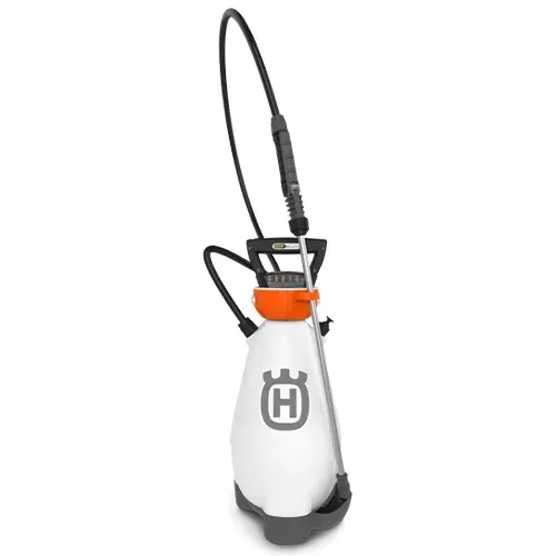 White Husqvarna backpack sprayer with orange top and black hose on a plain background