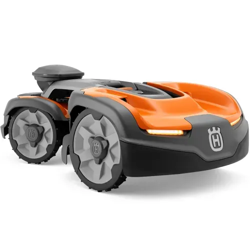 Orange and gray robotic lawn mower on white background