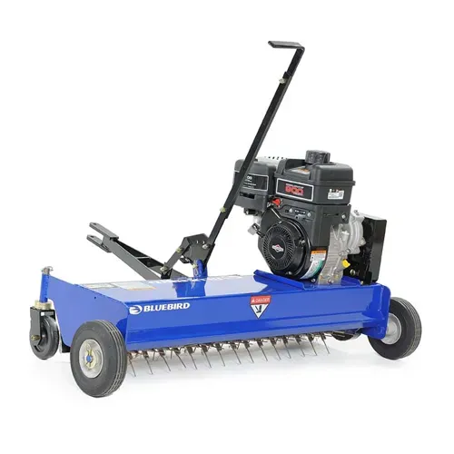 Blue tow-behind lawn aerator with black engine and small wheels on a white background