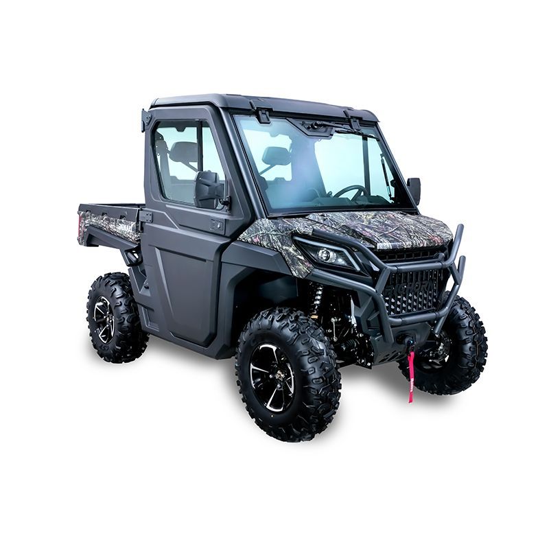 Black camo off-road utility vehicle with cargo bed and oversized tires on a white background