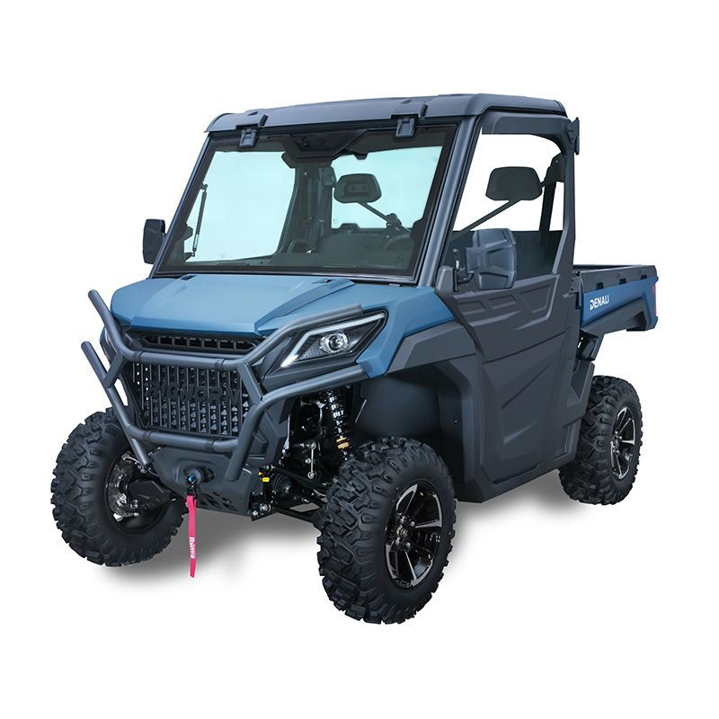 Blue off-road utility vehicle with roll cage, large tires, and a front winch, on a white background