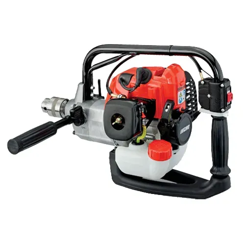 Red and black gas-powered drill with handle and bit attached on a white background