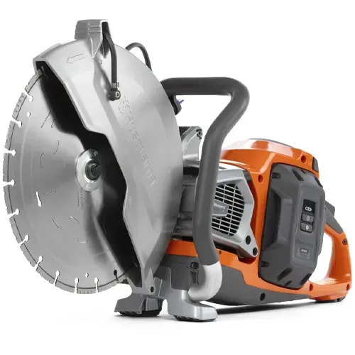 Orange and gray concrete cut-off saw with large blade and handle guard