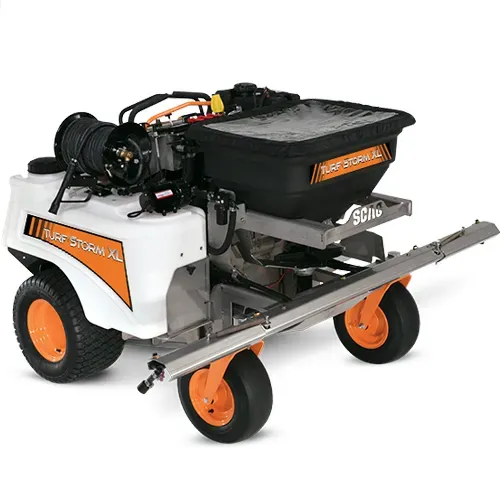 Orange and white SCAG zero-turn lawn mower with a black grass collection bag on a white background