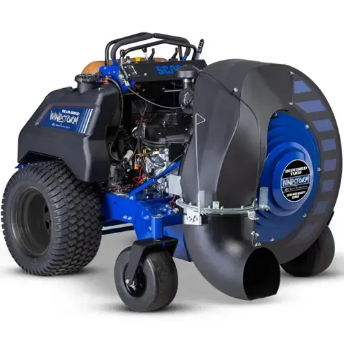 Blue-and-black wheeled leaf blower vacuum with large rear fan housing and front caster wheels
