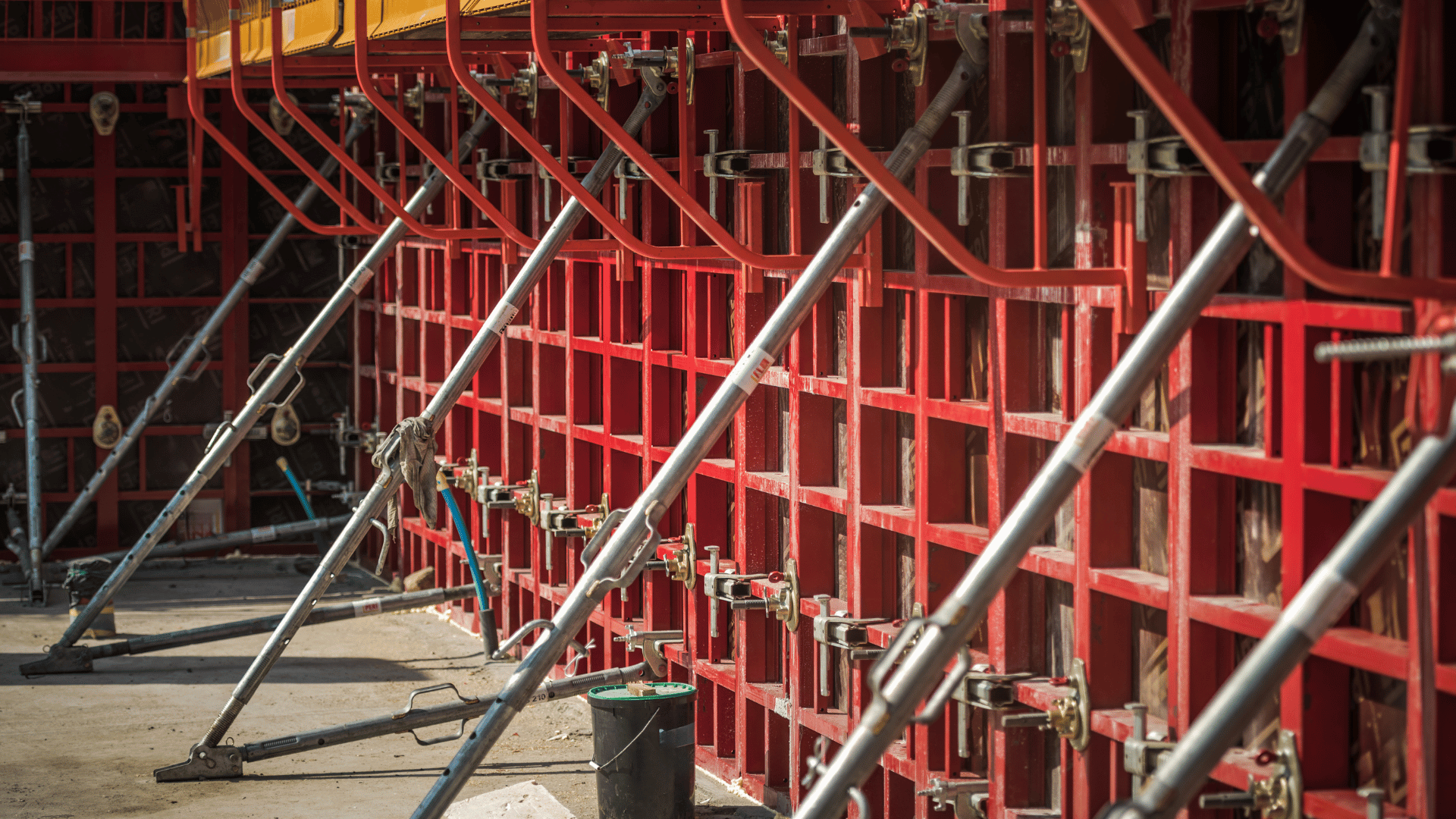 ICF bracing system supporting insulated concrete forms during wall alignment and concrete placement