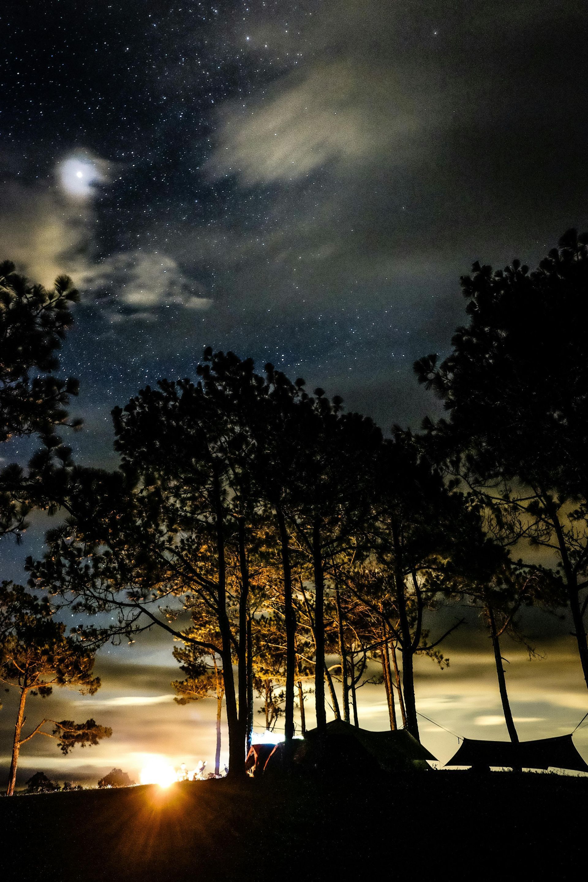 Cloudy night sky with trees - Connecting with God When Experiencing Hard Times