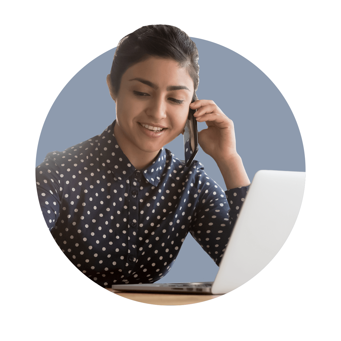 Professional woman talking on mobile phone with laptop