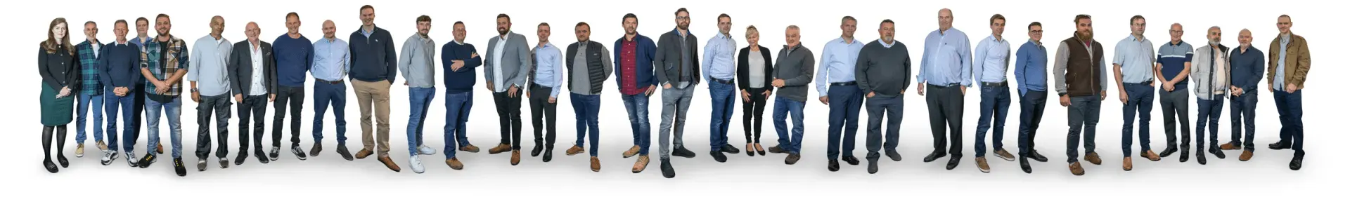 Group of people standing shoulder to shoulder on a white background, wearing mostly business casual clothes