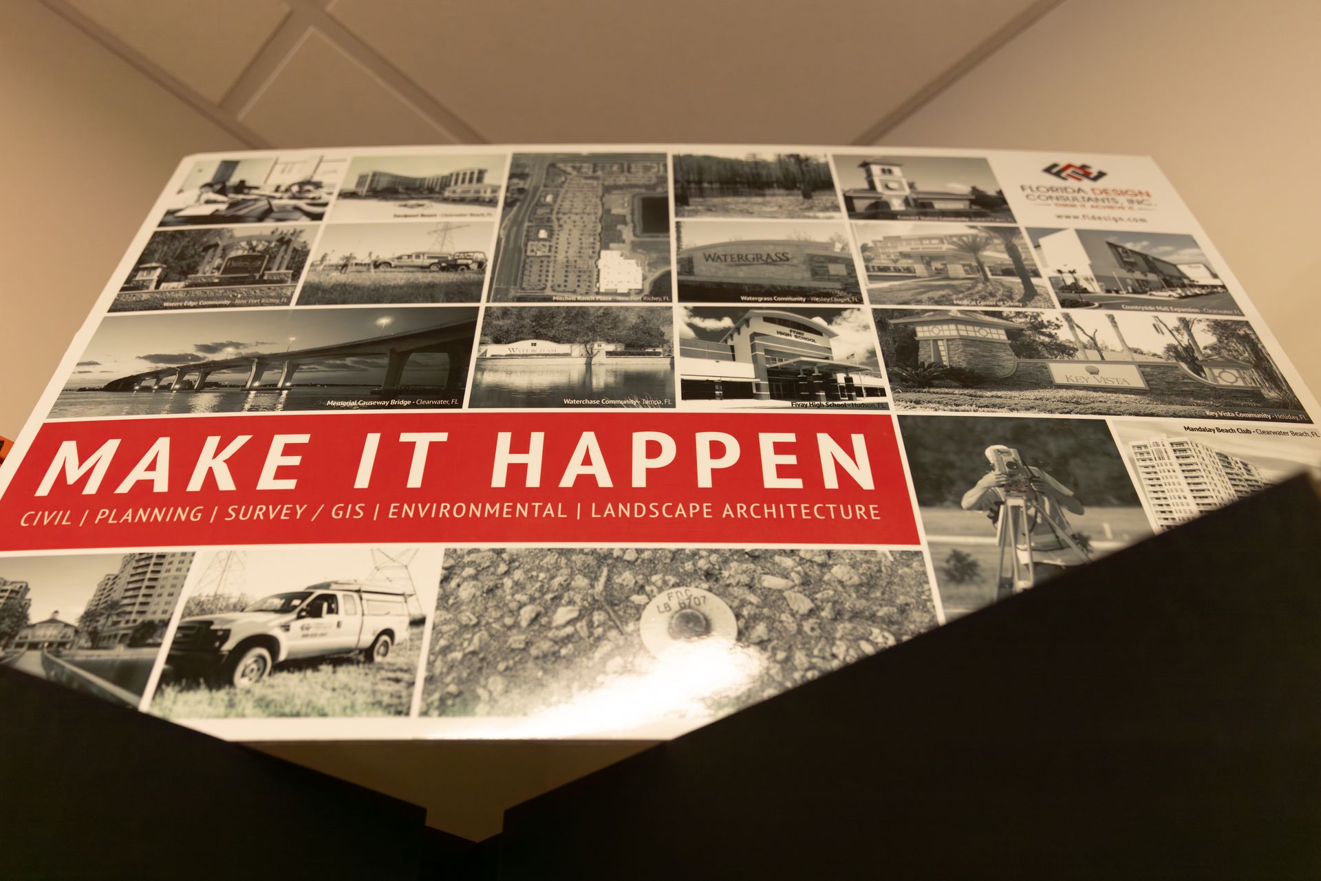 A poster that says make it happen on it