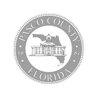 Pasco County, Florida seal: a statehouse over the Florida outline, encircled by 