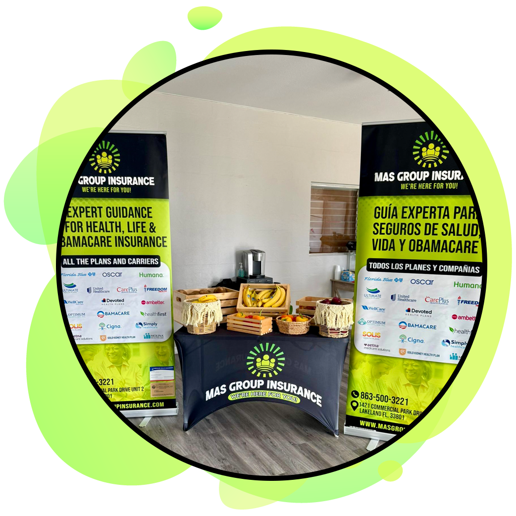 2 banners with fruit and vegs on a table in the middle