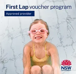 A child in a yellow swimsuit and pink goggles swimming, with