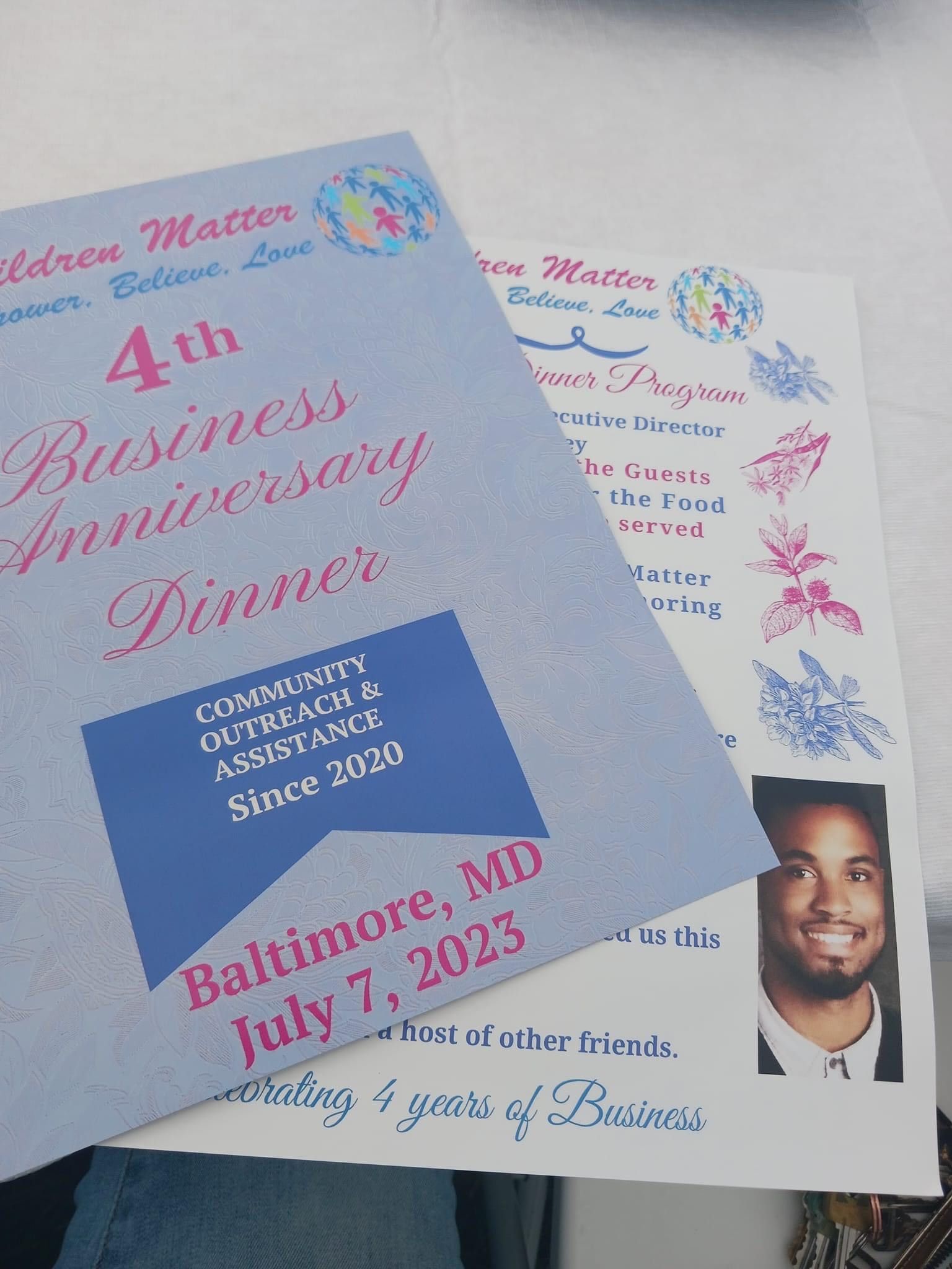 Two event flyers for a 4th business anniversary dinner in Baltimore, July 7, 2023. One features a photo of a man.