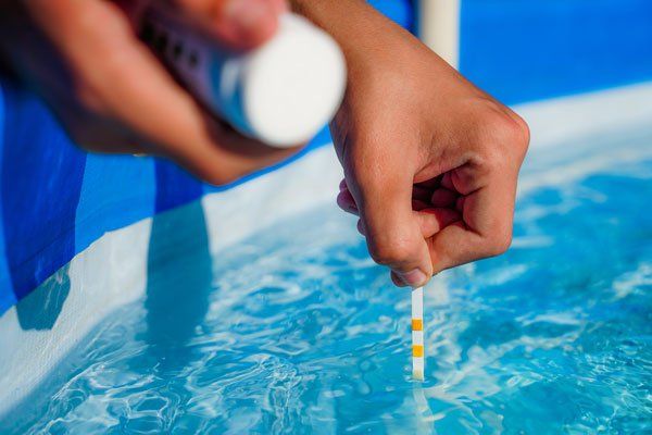 Client receiving pool filter repair services for their pool.