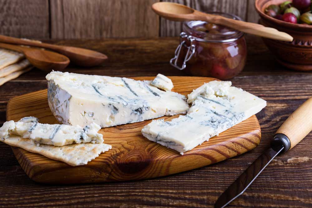 Blue Gorganzola cheese served with fresh gooseberries and homemade berry jam