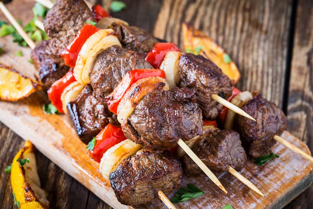 Grilled beef shishkabab skewers with vegetables