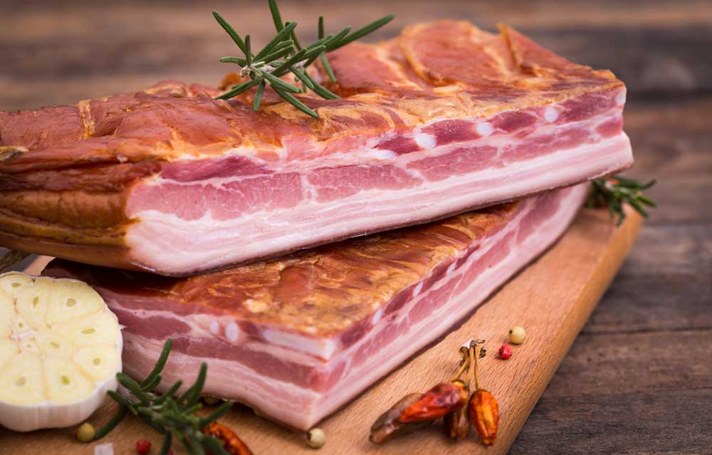 Homemade-smoked-bacon-on-wooden-board