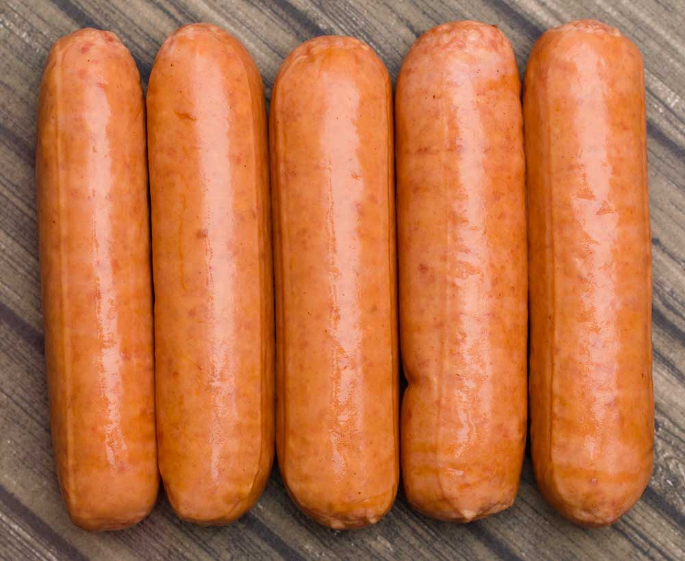 Hot Dogs Isolated on a Wooden Table