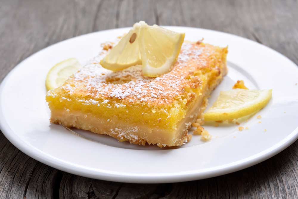 Lemon pie on white plate