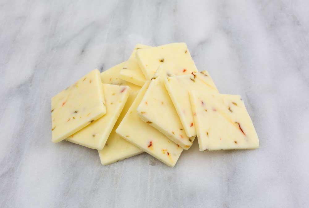 Pile-pepper-jack-cheese-on-a-marble-cutting-board