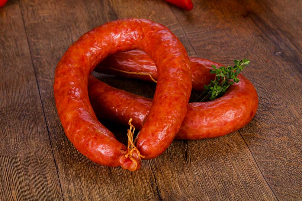 Pork sausages over wood