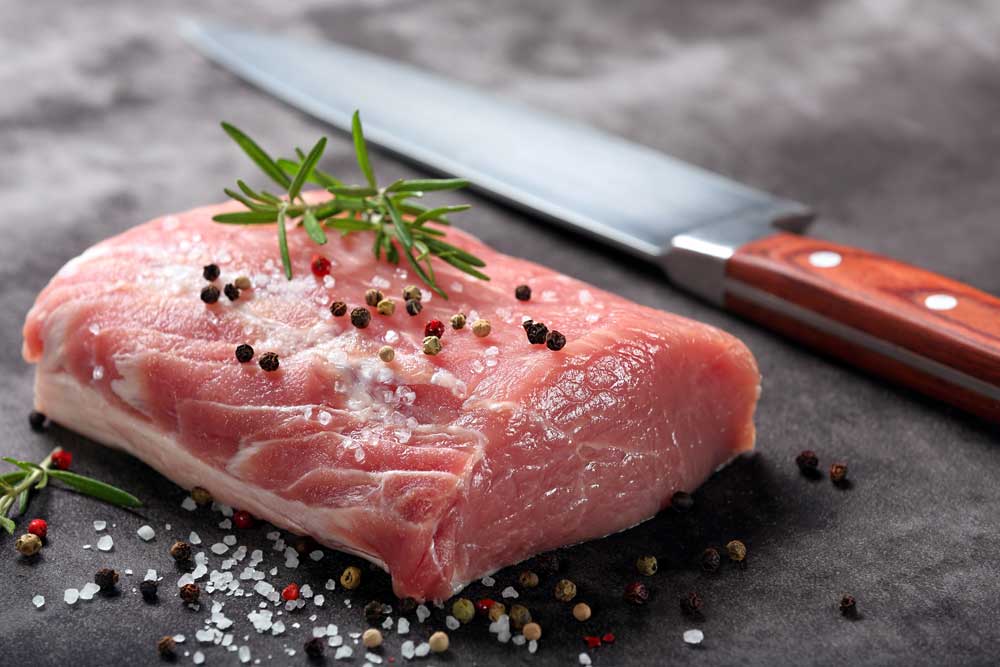Raw pork loin with spices