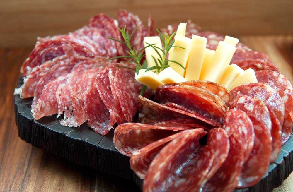 Salami-and-cheese-on-wooden-board