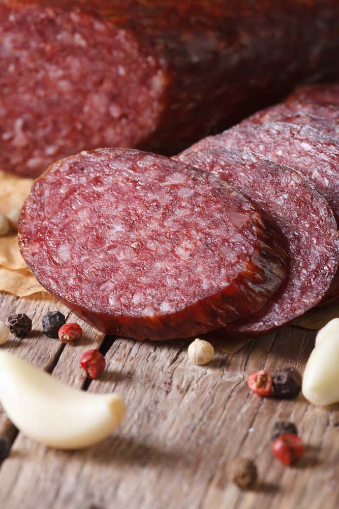 pork-barbecue-sausages-on-a-black-slate-board