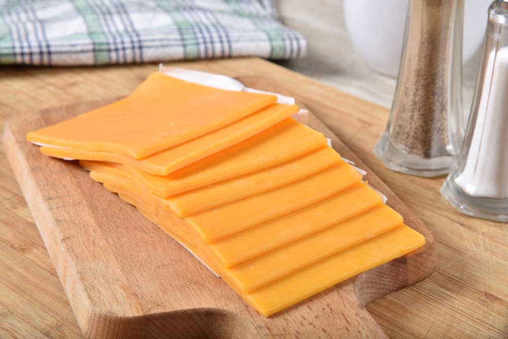 Slices+of+cheddar+cheese