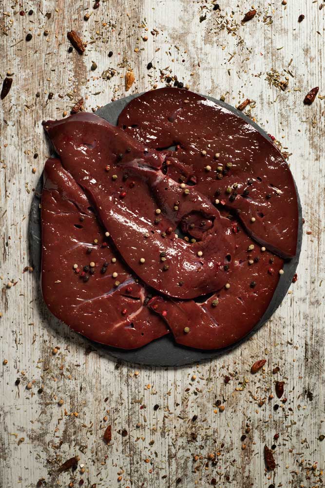 Slices of raw cow liver