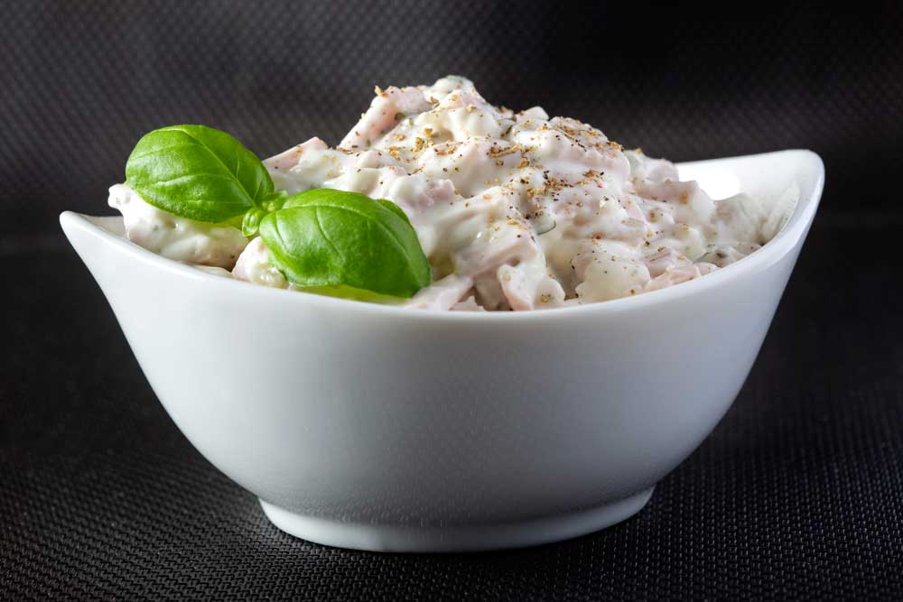 ham salad with mayonnaise and herbs