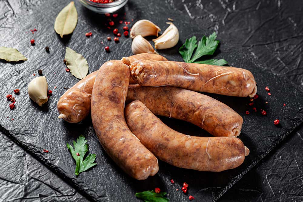 pork-barbecue-sausages-on-a-black-slate-board