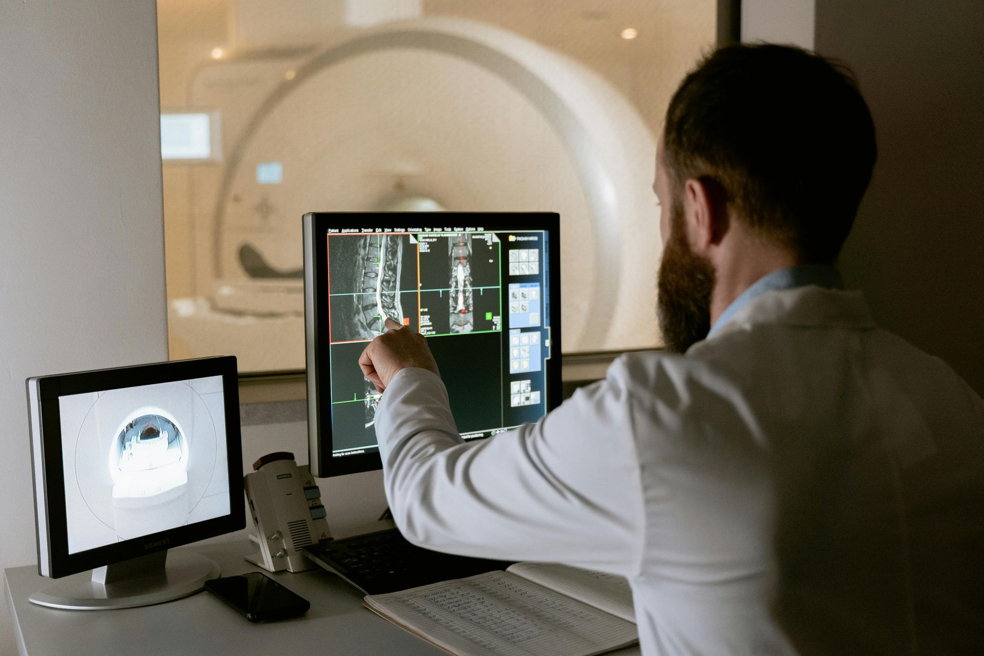Doctor reviewing scan images
